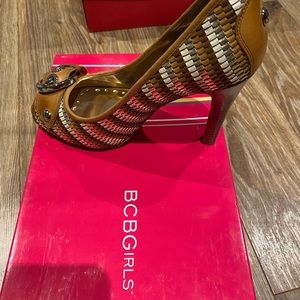 New open toe heels Around 2 inches high with a silver buckle on the front